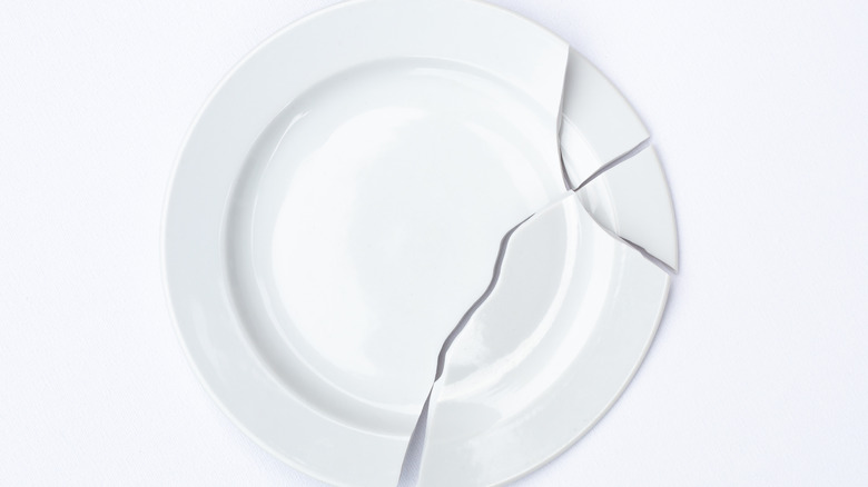 broken white plate white background