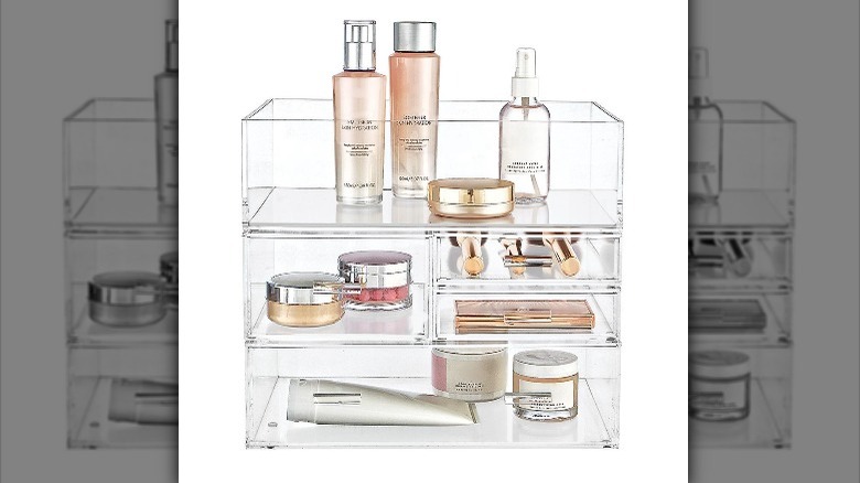 makeup stored neatly in acrylic container