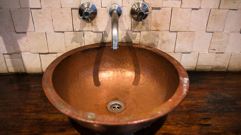 Aged copper sink