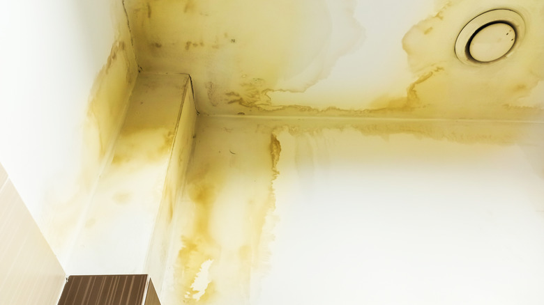 Water leak damage on wall and ceiling