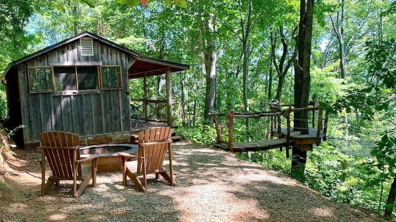 Cabin in forrest with bridge