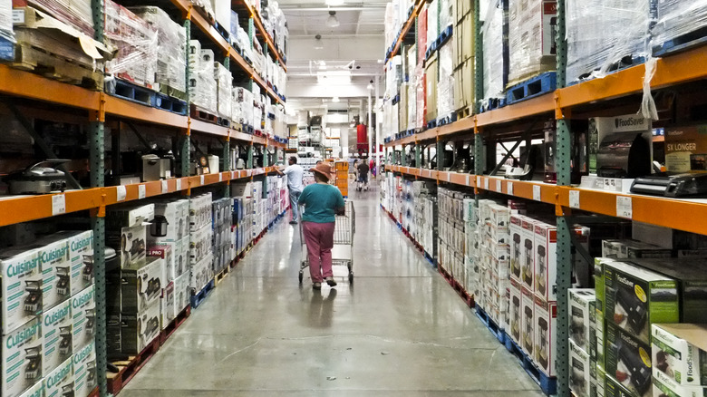 person shopping costco aisles 