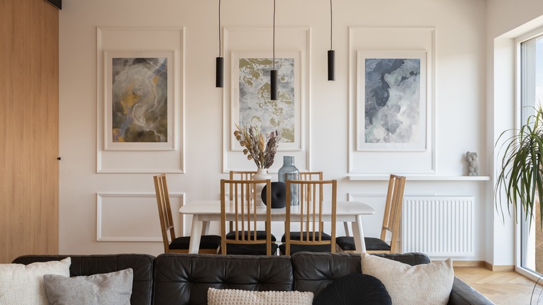 dining room with abstract artwork