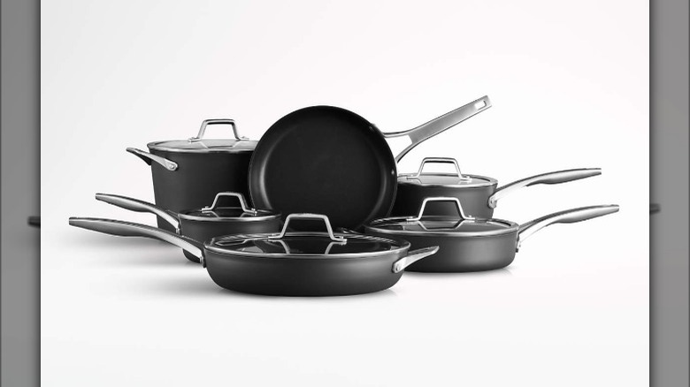 set of black pots and pans