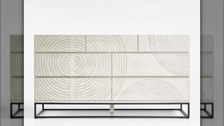 white dresser with geometric patterns