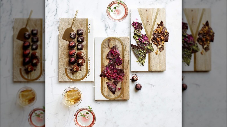 monogrammed serving boards with snacks 