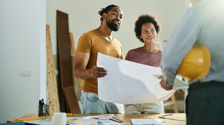 Couple planning their home renovation