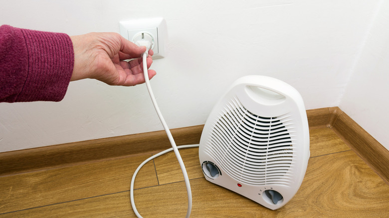 plugging space heater into wall