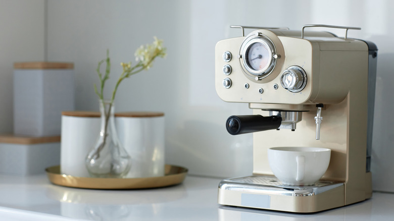 closeup of cream coffee machine