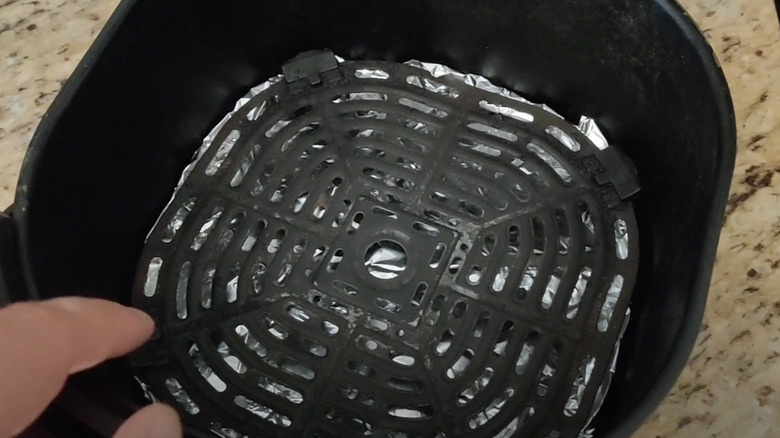 aluminum foil under basket