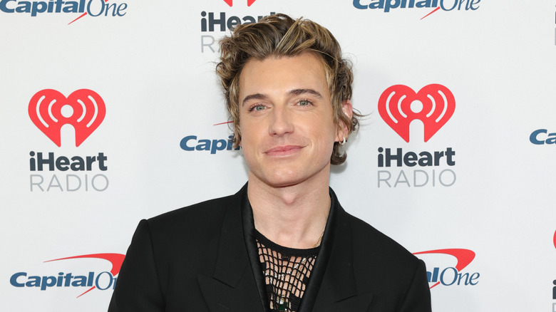 jeremiah brent smiling on the red carpet