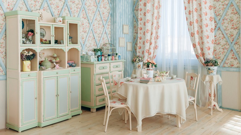 Vintage dining room with floral wallpaper