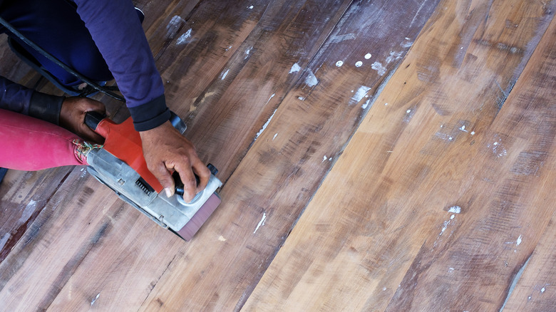 carpenter working on wood floor