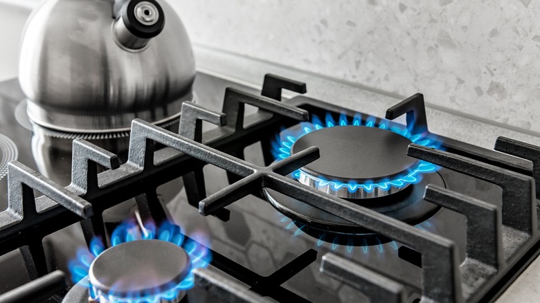 gas stove top with flame