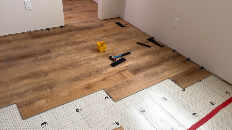 Vinyl plank flooring under installation