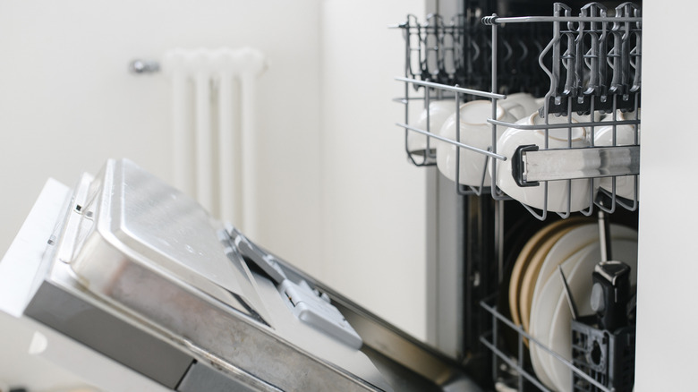 open stainless steel dishwasher 