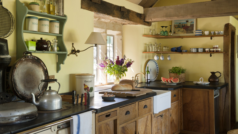 Cottage style kitchen with wood cabinets