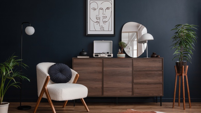 Sleek black-walled living room 