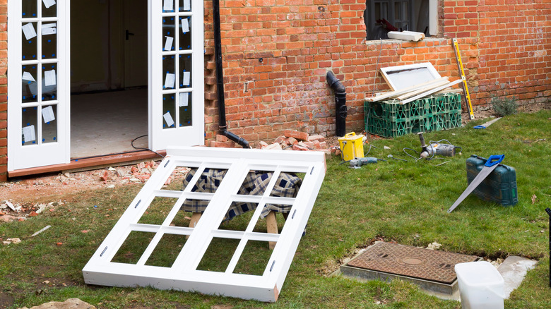 French door being installed exterior