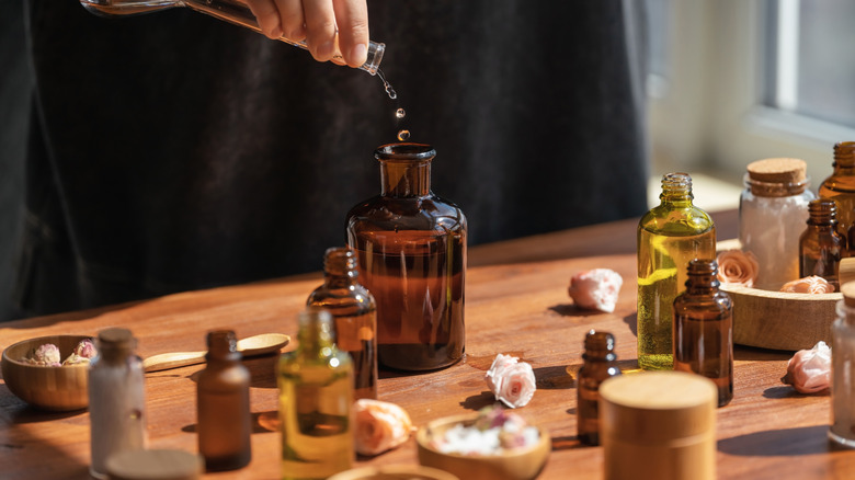 Person mixing essential oils