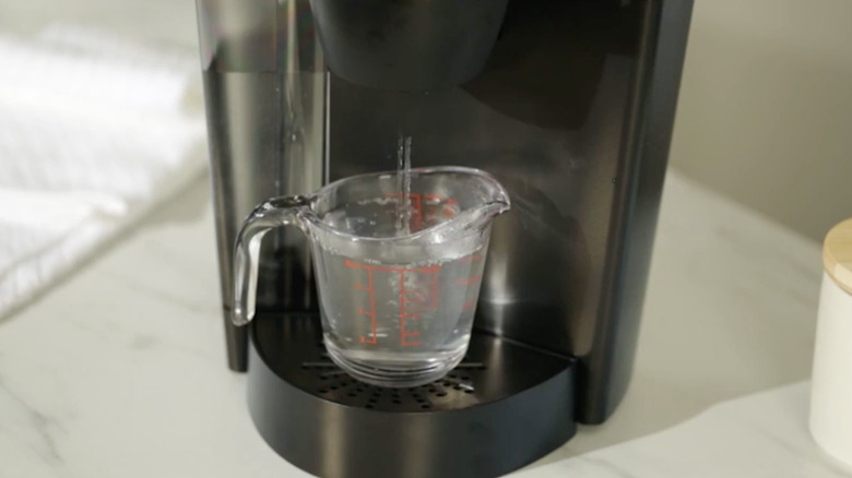 Water pours out of Keurig