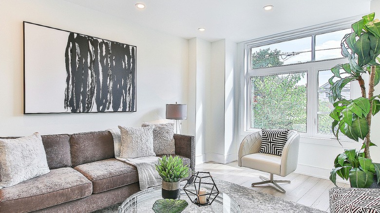 Living room with low ceilings and a large window