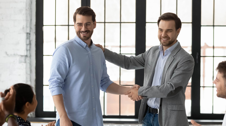 two men at work in office