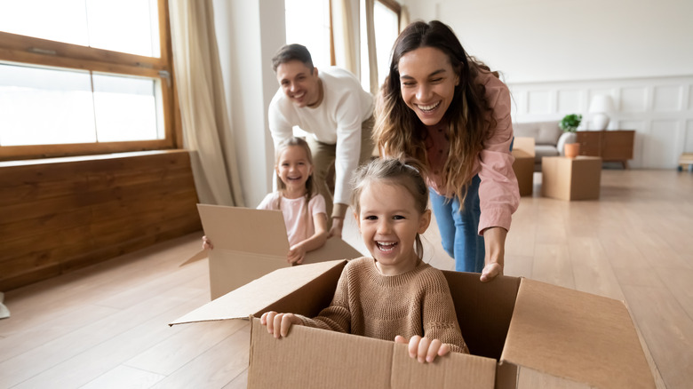 family with moving boxes