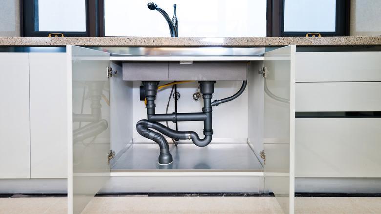 open cabinets under sink