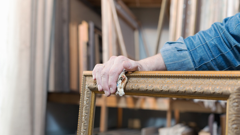 Wiping large picture frame