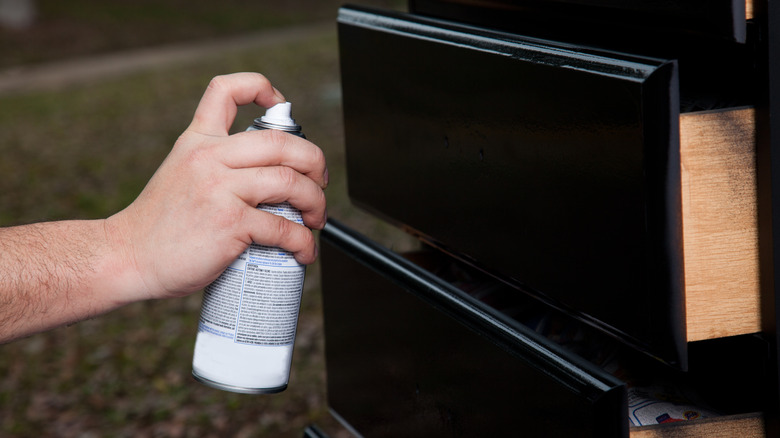 Spray painting a kitchen cabinet