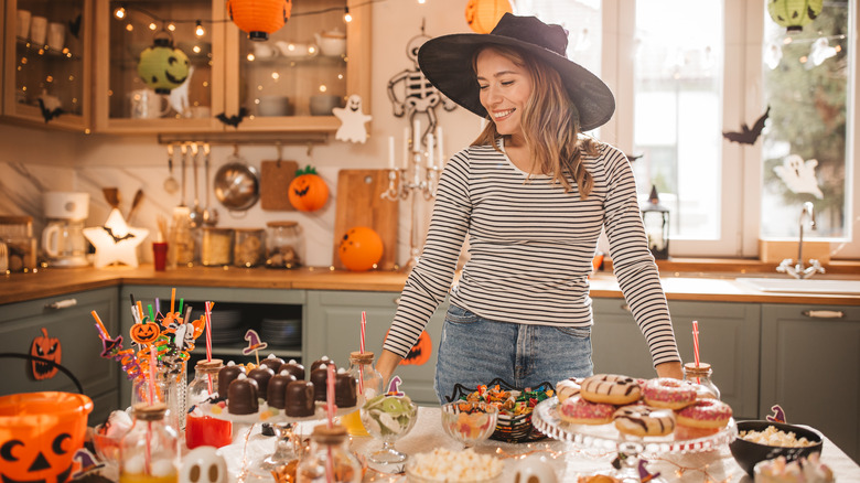 Woman serving Halloween treats