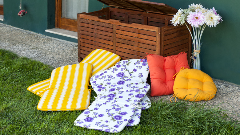 outdoor cushions outside of storage box