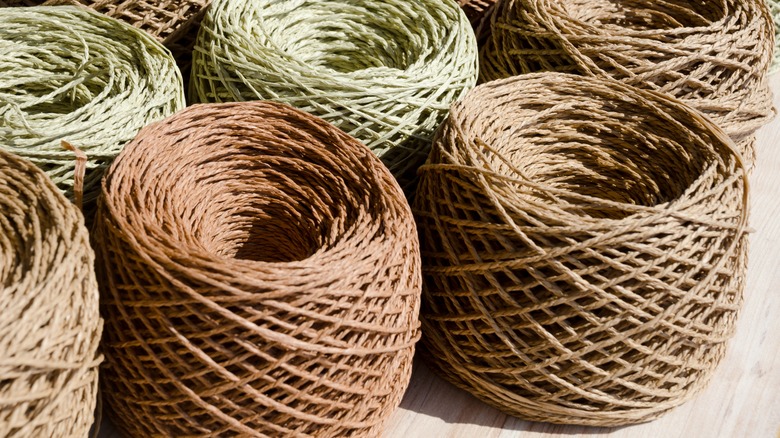 wrapped raffia balls on a table