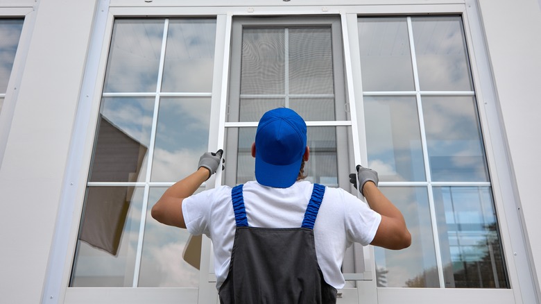 man installing windows