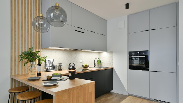 Gray and black kitchen cabinets