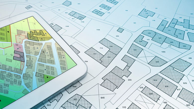 Building map on a tablet and a paper