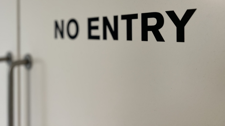 No entry sign on door