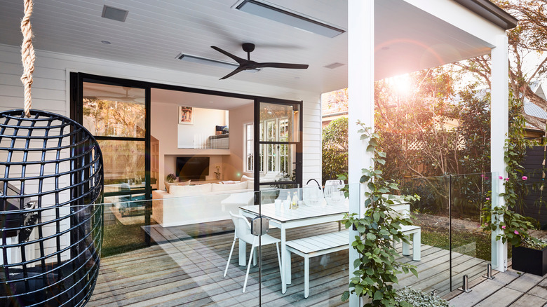 Black modern ceiling fan in outdoor patio space