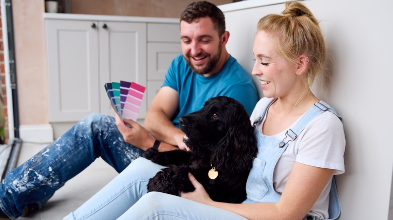 Couple choosing kitchen paint color