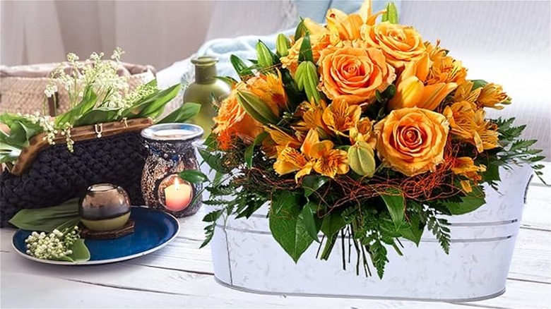 flowers in galvanized metal bin