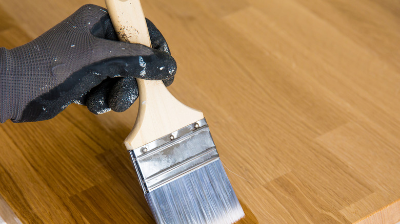 applying stain to wood