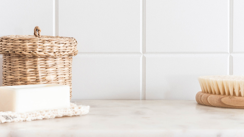 Basket, soap, and scrub brush