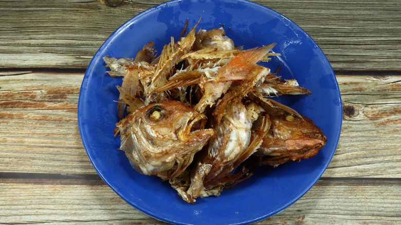 leftover fish bones and heads