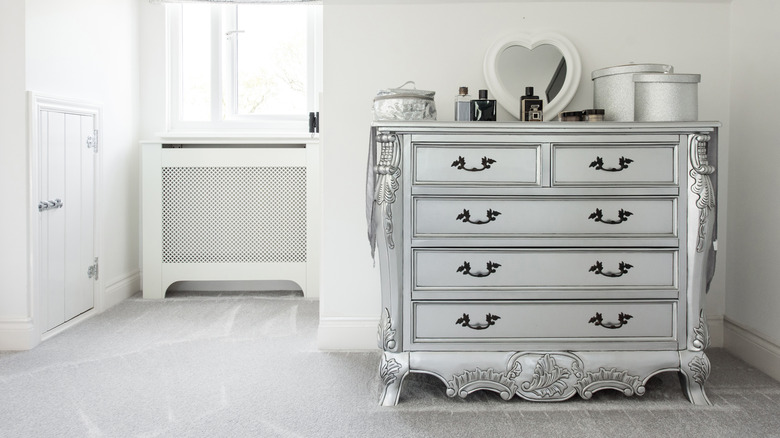 Silver leaf dresser in bedroom