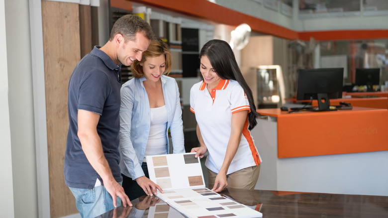 couple shopping for flooring materials