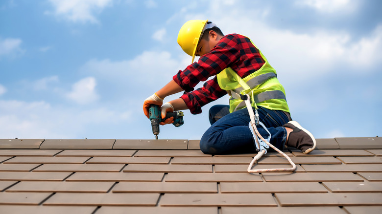 Man working on roof