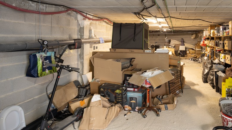 A messy basement with a lot of clutter