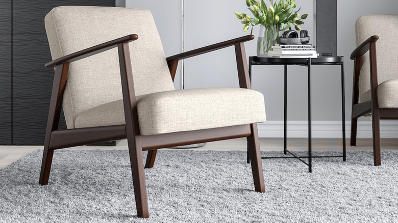 EKENÄSET armchair from IKEA rests on a gray carpet