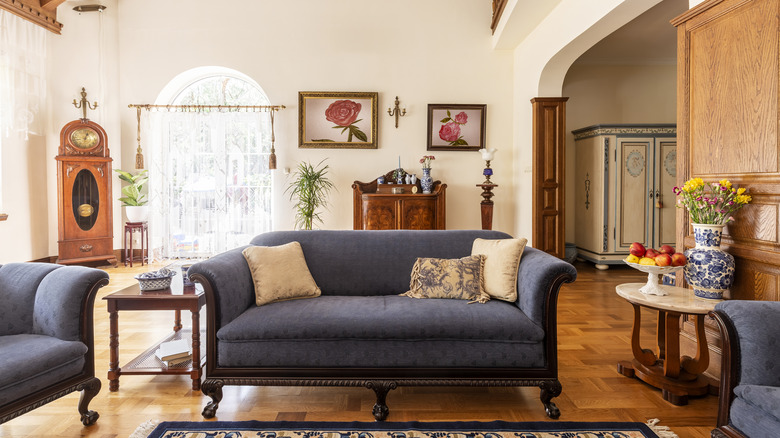 english living room with antiques